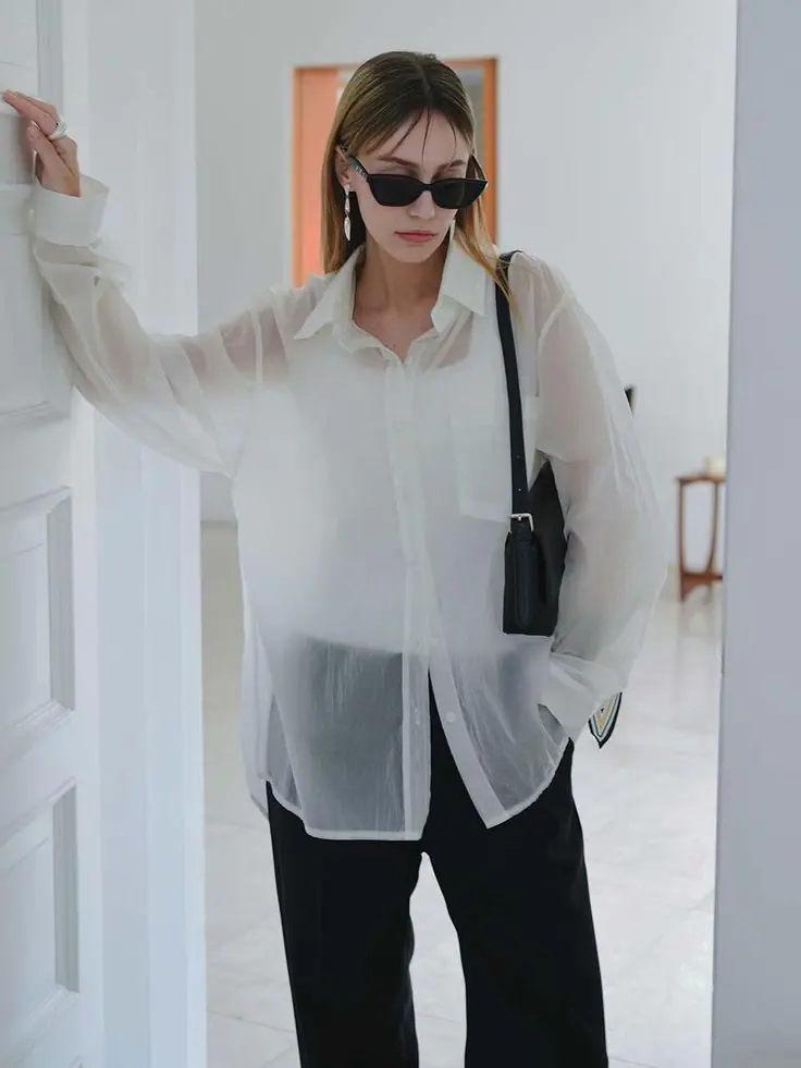 Sheer fashion has been circling for a few seasons, but Summer 2026 is where it finally becomes wearable for real life. Stella McCartney and Tom Ford led the charge with lingerie-inspired sheer at their Spring/Summer 2026 shows — but the way the style world is actually wearing it has nothing to do with barely-there dressing.