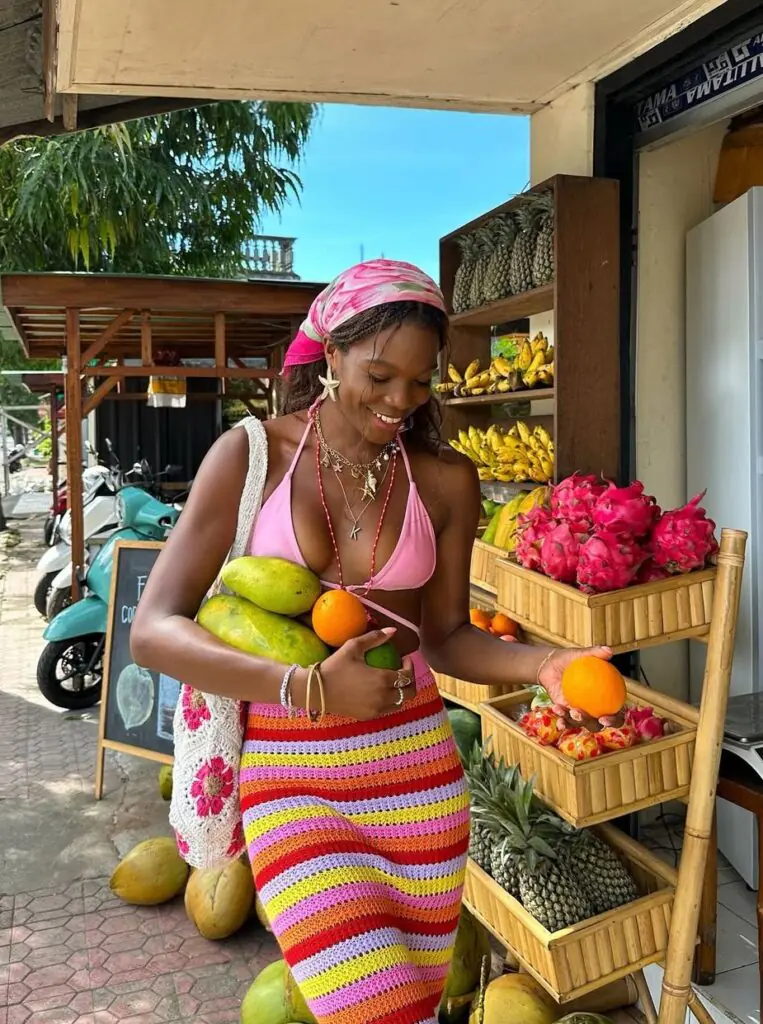 For beach days, they say nothing beats a crochet cover-up over a bright, confident bikini. We love pairing a white or cream crochet top or dress with a coral, tangerine, or cobalt blue swimsuit underneath. 