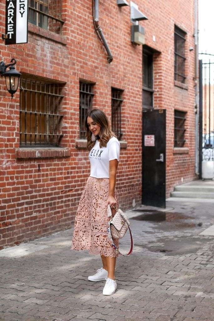 A sheer printed midi skirt is one of the most versatile summer pieces you'll own. They dress it up with a silk tank and heels, or dress it down with a basic white tee and flat sandals.