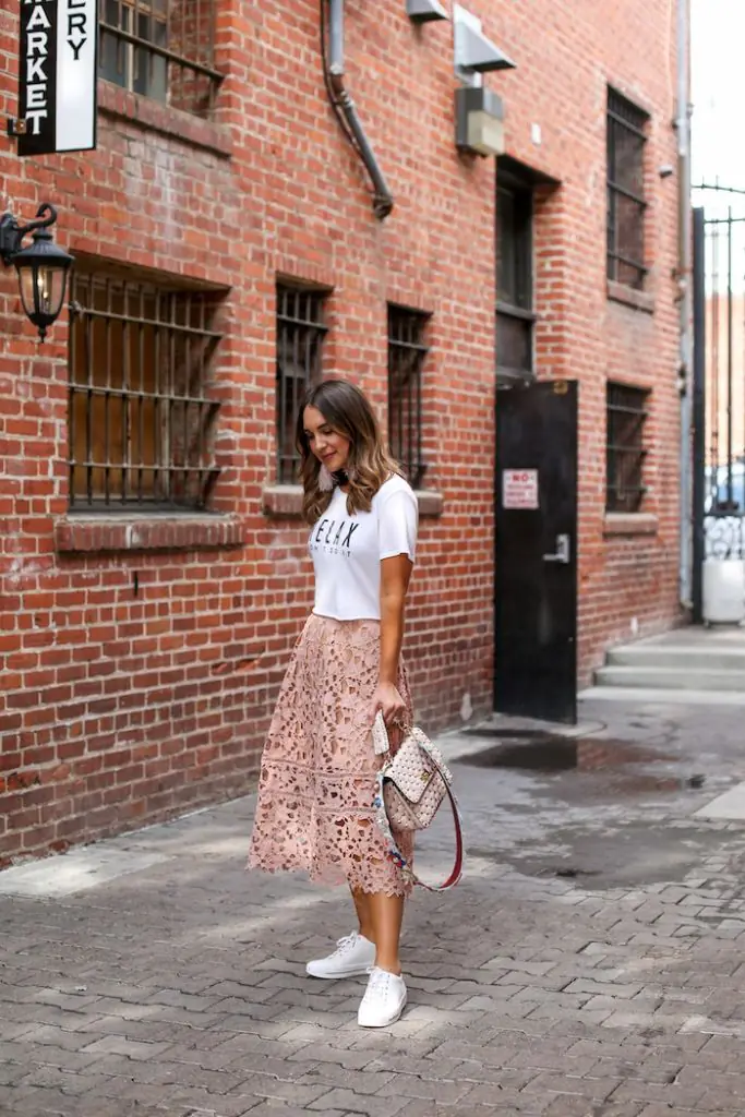 A sheer printed midi skirt is one of the most versatile summer pieces you'll own. They dress it up with a silk tank and heels, or dress it down with a basic white tee and flat sandals.