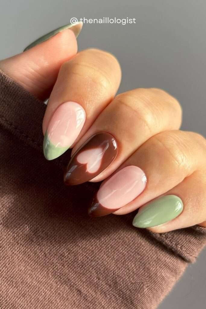 Sage green and chocolate brown nails together feel like a walk through an autumn forest — earthy, organic, and genuinely beautiful. The mixed accent nail approach lets you wear both trendy fall colors at once.