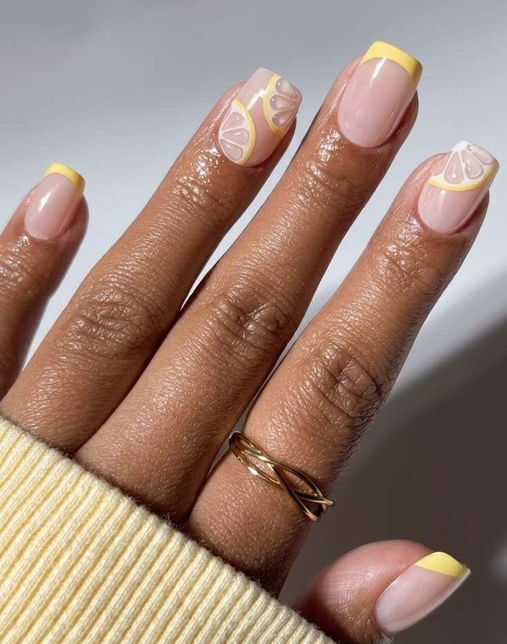 Brighten up your summer feed with this playful yet meticulous design featuring crisp pastel yellow tips and ultra-realistic 3D lemon slice nail art. The immaculate square shape and glossy, sheer base keep the vibrant fruit motifs looking elevated and intentionally structured rather than kitschy. It strikes the perfect balance for July, offering a refreshing.
