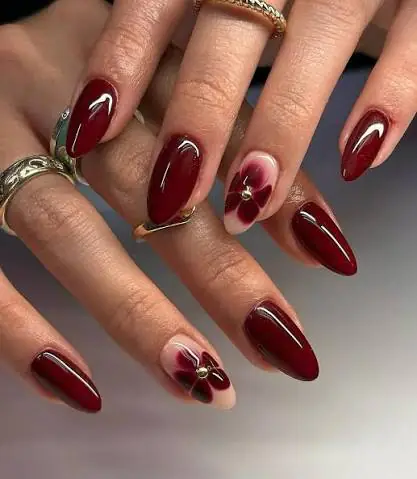 Deep burgundy is the kind of color that instantly makes your hands look more put together. It has just enough red undertone to feel festive without veering into full holiday territory too early in the season.
