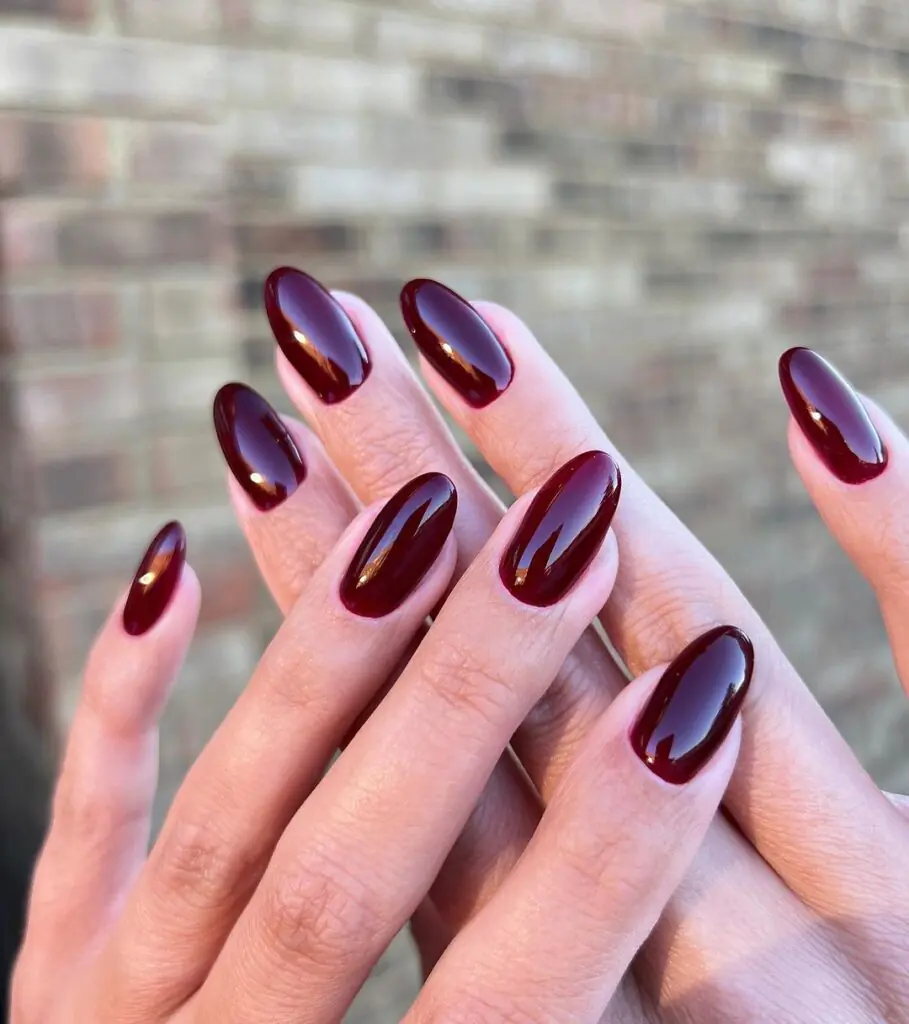 Deep burgundy is the kind of color that instantly makes your hands look more put together. It has just enough red undertone to feel festive without veering into full holiday territory too early in the season.