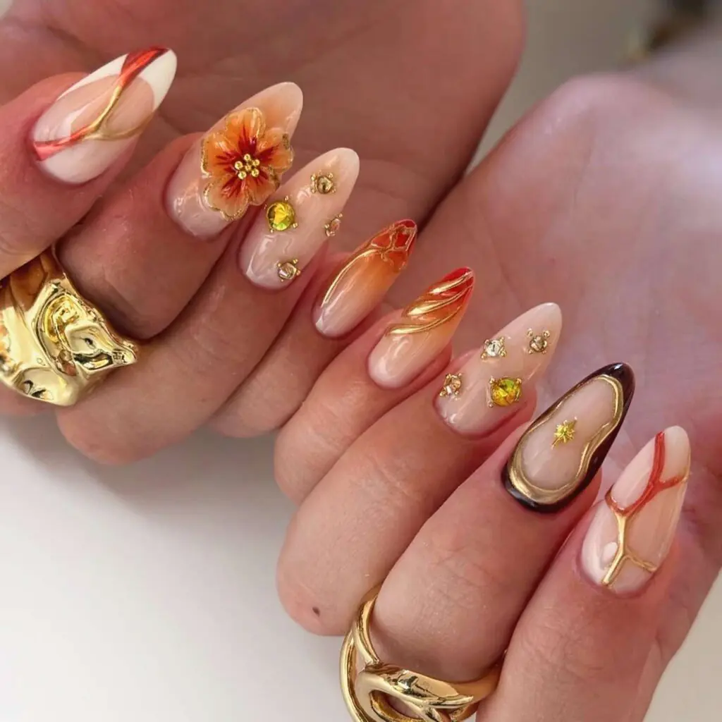 Elevate your August 2026 nail trends lineup with this opulent, texture-rich manicure that seamlessly transitions from late summer warmth into rich autumn aesthetics.