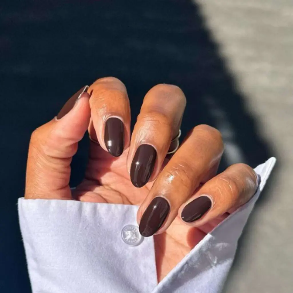 Not quite black, not quite brown — espresso sits right in between and feels a lot more wearable than jet black for daytime wear. It's a favorite among people who want a moody manicure that still reads as sophisticated rather than costume-like or overly harsh.