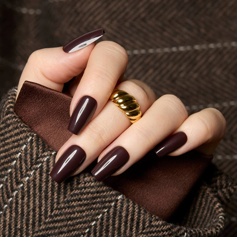 Not quite black, not quite brown — espresso sits right in between and feels a lot more wearable than jet black for daytime wear. It's a favorite among people who want a moody manicure that still reads as sophisticated rather than costume-like or overly harsh.