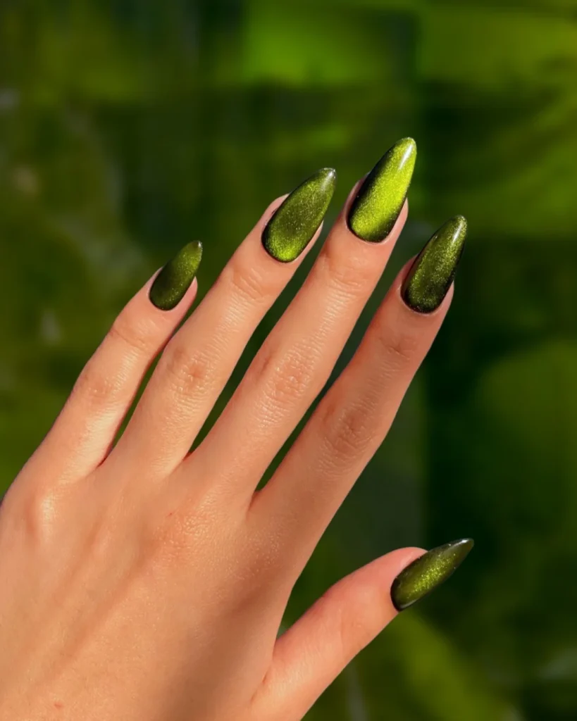 Peridot Velvet August Nails. Capture the ultimate late-summer vibe with "Peridot Velvet" magnetic almond nails, a standout shade for your August 2026 manicure lookbook.