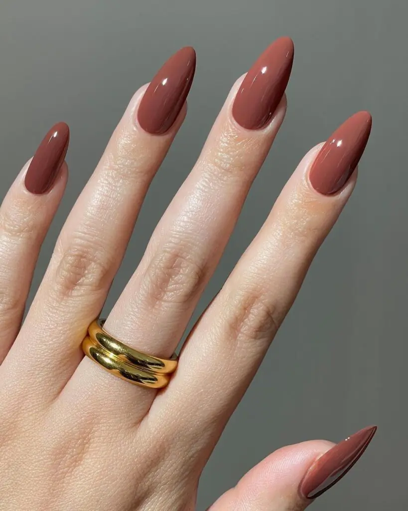 If you're more of a neutral-nail person, toffee is your fall answer to the classic nude manicure. It's warmer and richer than your typical spring nude, giving off a soft, your-nails-but-better vibe that works with literally any outfit you own.