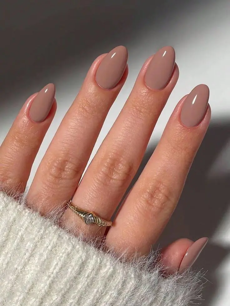 If you're more of a neutral-nail person, toffee is your fall answer to the classic nude manicure. It's warmer and richer than your typical spring nude, giving off a soft, your-nails-but-better vibe that works with literally any outfit you own.