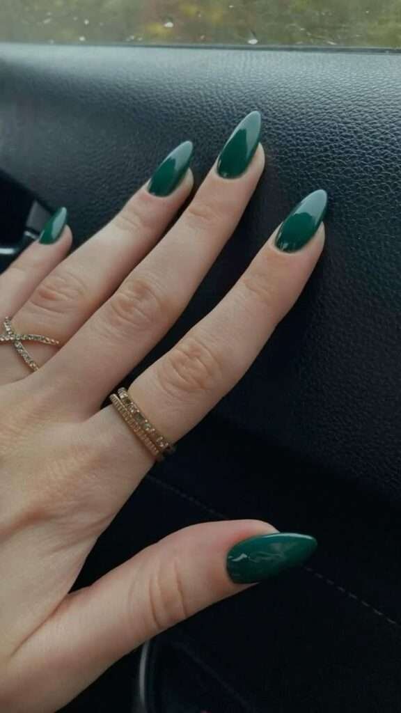 Forest green nails bring a little bit of drama without feeling costume-y or over the top. This shade pairs beautifully with gold accents and looks especially rich in a cream or satin finish rather than high gloss, which can sometimes read as too bright for the deep tone.