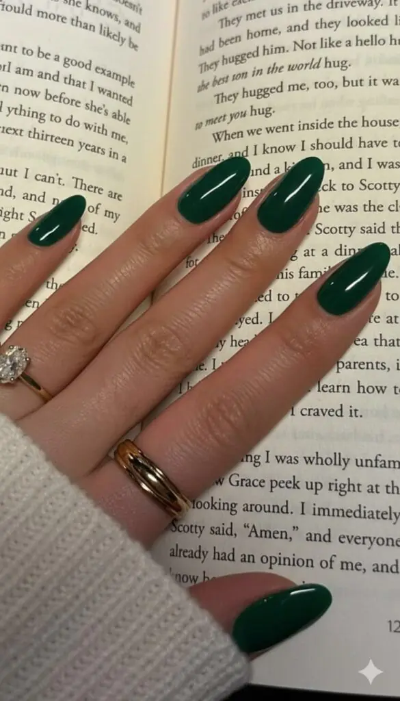 Forest green nails bring a little bit of drama without feeling costume-y or over the top. This shade pairs beautifully with gold accents and looks especially rich in a cream or satin finish rather than high gloss, which can sometimes read as too bright for the deep tone.