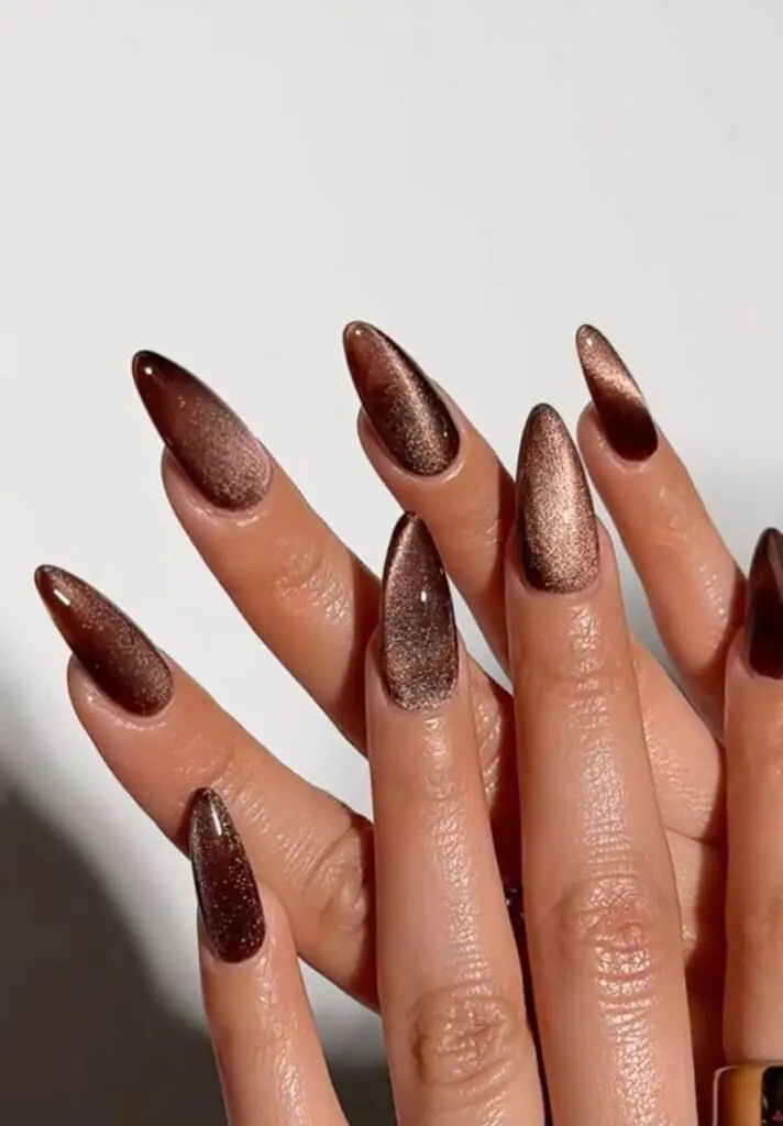 Golden caramel nails have that warm, glowy quality that looks amazing with a slight shimmer finish. It's a great option if you want something that still feels bright and warm as the days get shorter and everything else starts leaning darker.