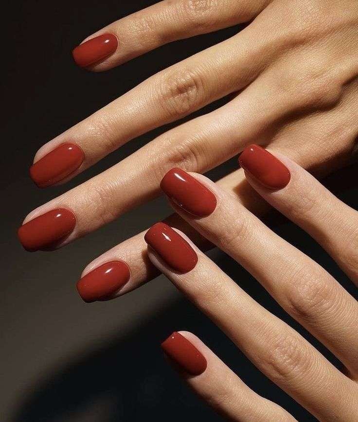 Rust red is bolder than terracotta and warmer than burgundy, landing in this perfect in-between zone that feels distinctly autumn. It's an easy way to add color to your manicure without straying from a fall-appropriate palette, and it looks incredible against tan or olive skin tones especially.