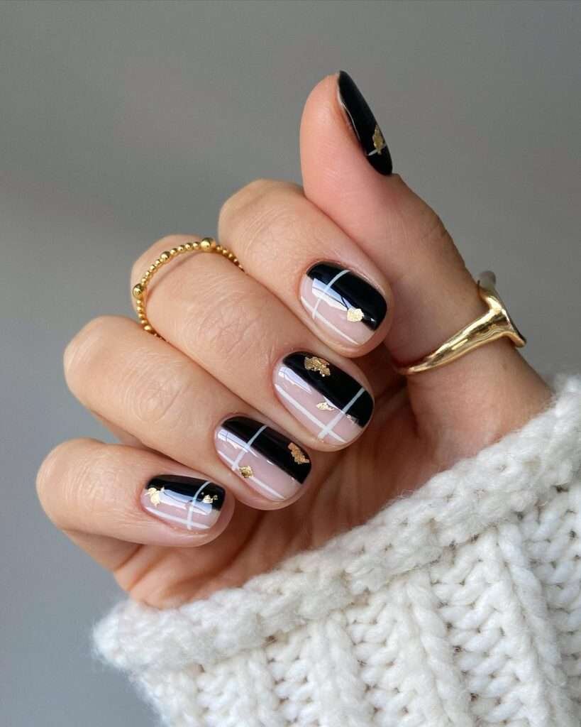 Black and nude always have a little attitude, and the fine gold flakes keep this manicure from feeling too severe. The crossed lines create a ribbon-like plaid effect, so even the shorter nails look detailed and intentional. This is my pick when you want Halloween nail inspiration that can still move easily into November.