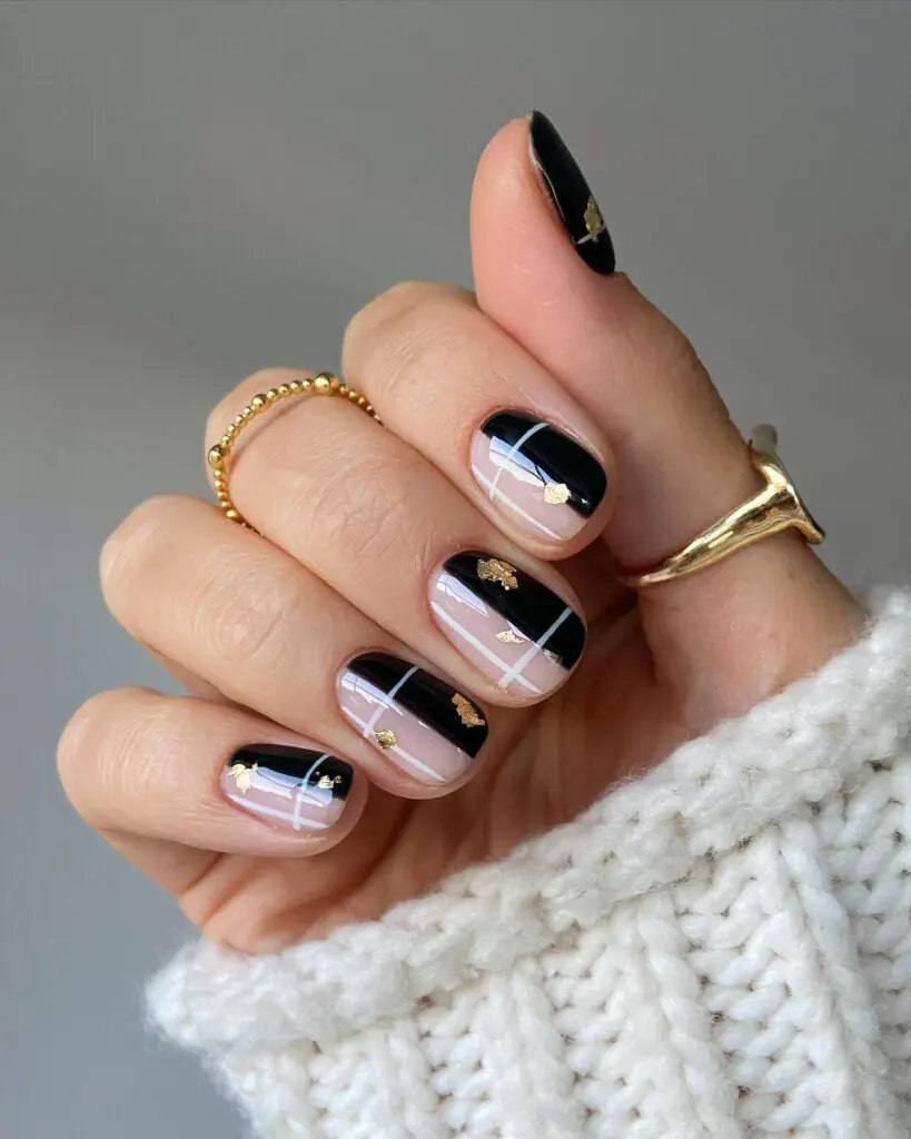 Black and nude always have a little attitude, and the fine gold flakes keep this manicure from feeling too severe. The crossed lines create a ribbon-like plaid effect, so even the shorter nails look detailed and intentional. This is my pick when you want Halloween nail inspiration that can still move easily into November.