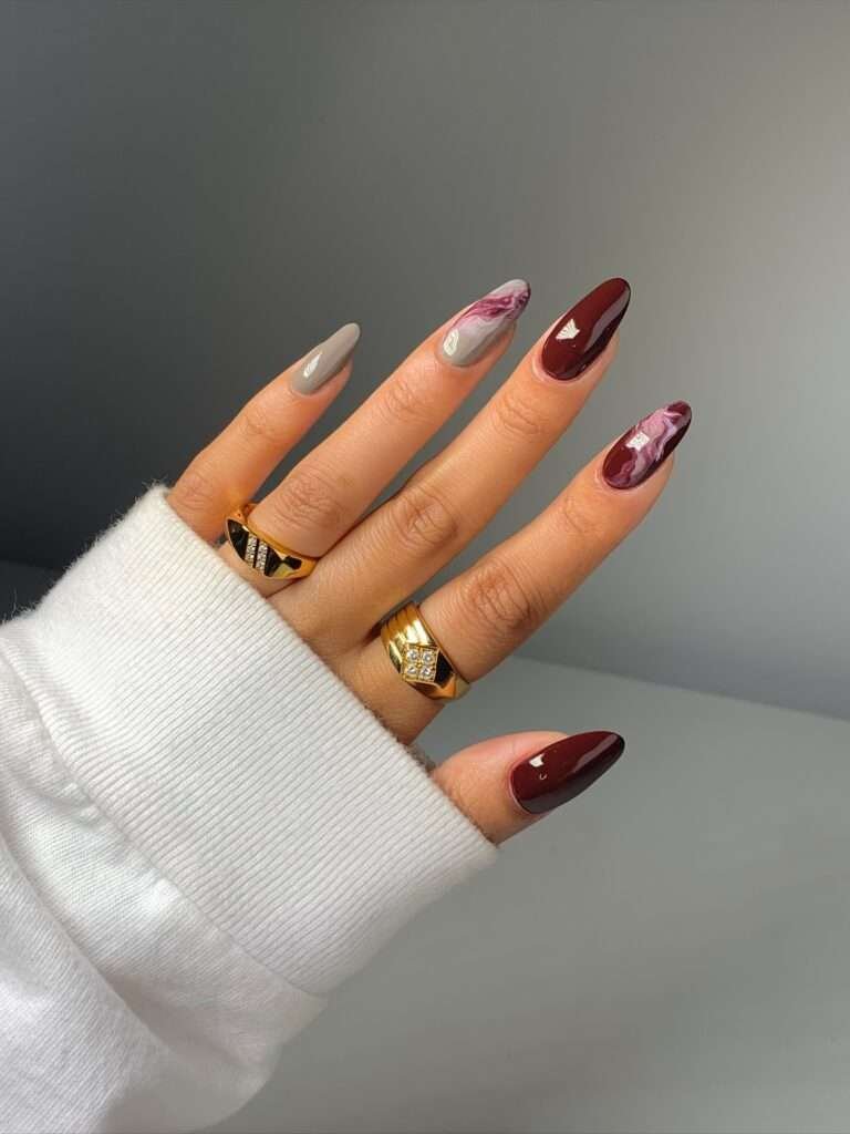 Brown nails are having their best season, and this mocha aura look shows why. The diffused cocoa center gives the manicure depth, while the darker tips outline the almond shape without making it feel heavy. If you are saving fall nail ideas on Pinterest, this is the one I would bookmark for everyday wear.