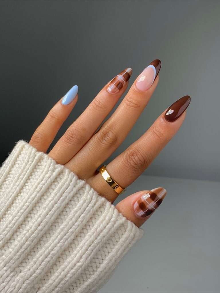 Icy Blue and Cinnamon Tortoiseshell. A little contrast can make a seasonal manicure feel fresh. Icy blue brings a clear, almost frosty note, while cinnamon tortoiseshell warms the design back up so it still belongs in October. I love this mix when you want autumn inspiration without repeating the same burgundy-and-brown palette everyone else is wearing.