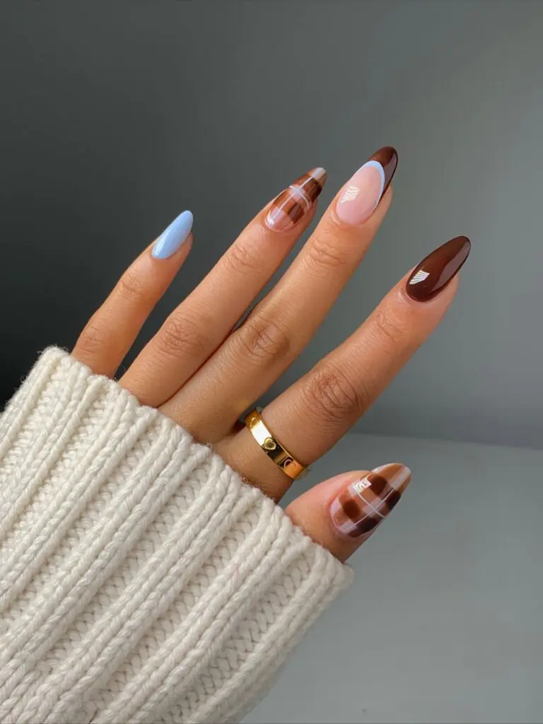 Icy Blue and Cinnamon Tortoiseshell. A little contrast can make a seasonal manicure feel fresh. Icy blue brings a clear, almost frosty note, while cinnamon tortoiseshell warms the design back up so it still belongs in October. I love this mix when you want autumn inspiration without repeating the same burgundy-and-brown palette everyone else is wearing.