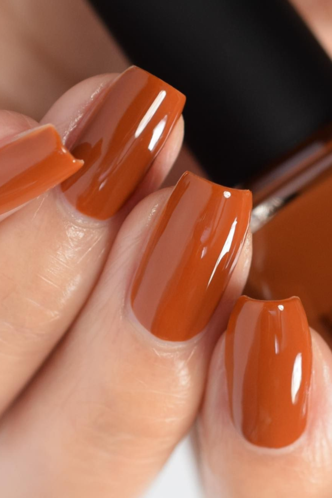 I know orange nails are often associated with October and Halloween, but burnt orange deserves a place in your November manicure rotation, too. The trick is choosing the right shade. Instead of bright pumpkin orange, look for something deeper and more muted, with hints of rust, terracotta, or warm brown. These earthy undertones make burnt orange feel far more sophisticated and wearable as autumn moves toward winter.