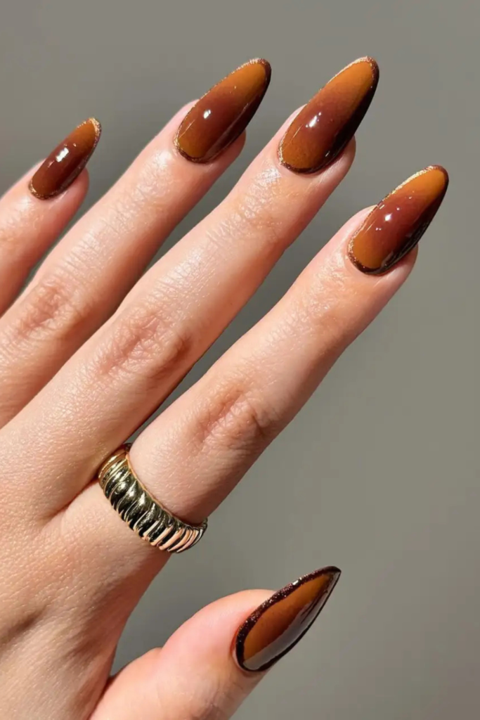 Not every November manicure has to be dark. Caramel brown is a wonderful option if you enjoy warm, flattering neutrals but want something with more personality than a traditional nude. This golden-brown shade sits somewhere between honey, toffee, and light coffee. It gives your nails warmth without the intensity of chocolate or espresso. And that makes it especially lovely for everyday manicures.