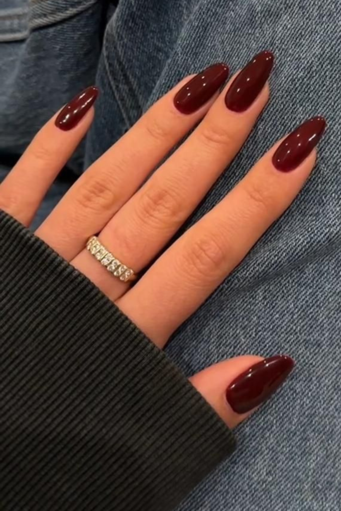 Dark cherry red is one of those nail colors that instantly catches my attention. It has the richness of burgundy but with a slightly brighter, fruitier red undertone that becomes especially noticeable in natural light. If you love traditional red manicures but want something more seasonal for November, this is a shade I would seriously consider.