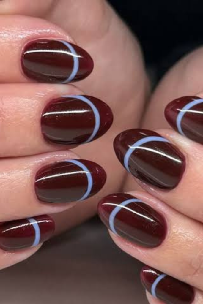Espresso brown nails are for those moments when you want something darker than chocolate but aren't quite ready to commit to black. Inspired by the deep color of freshly brewed coffee, this nearly black-brown shade feels sophisticated, minimal, and a little mysterious. I find espresso particularly appealing for November because it works with the richer colors we naturally start wearing this time of year. Think black trousers, dark-wash denim, tailored wool coats, and chunky cream sweaters.