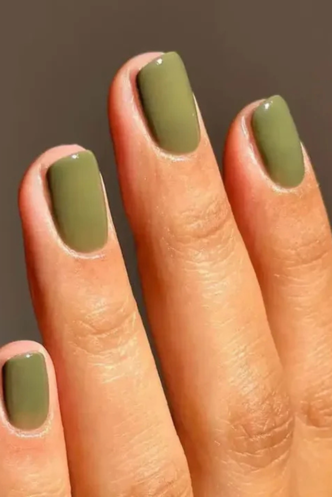 Olive green might not be everyone's first choice for a manicure, but I think that's exactly what makes it so interesting. It's earthy, muted, and unexpectedly versatile. Unlike bright green nails, olive has a softened yellow or brown undertone that allows it to work almost like a neutral. If your wardrobe leans toward cream, beige, denim, camel, and black, olive green can be an easy color to introduce without feeling too bold.