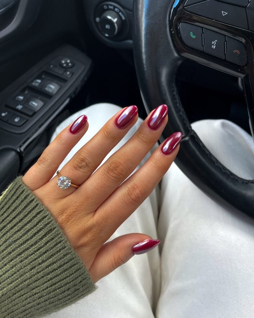 This is chrome for someone who doesn’t want chrome. The base is a dark cherry, and the shimmer shifts between blue and violet depending on the light. It’s subtle indoors and a little more dramatic outside.
