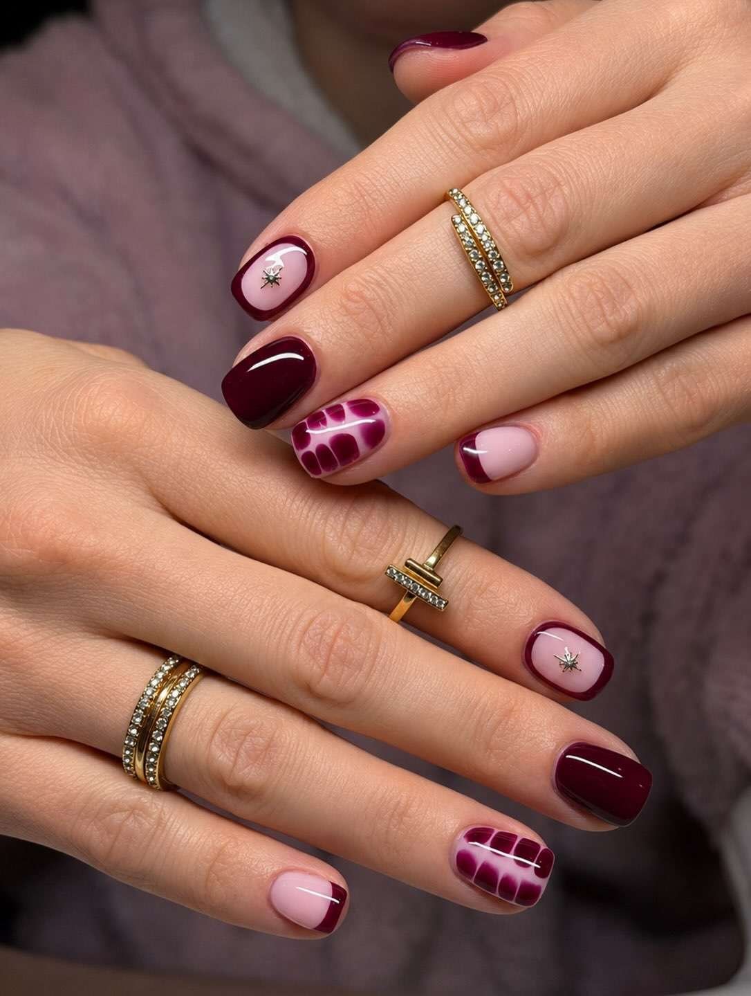 Plaid is a lovely bridge between Halloween and the rest of fall. Deep burgundy, dusty pink, and a few fine intersecting lines feel cozy and a little gothic—especially with a darker accent nail. Choose this if you want October style that still feels right after the candy bowl is put away.
